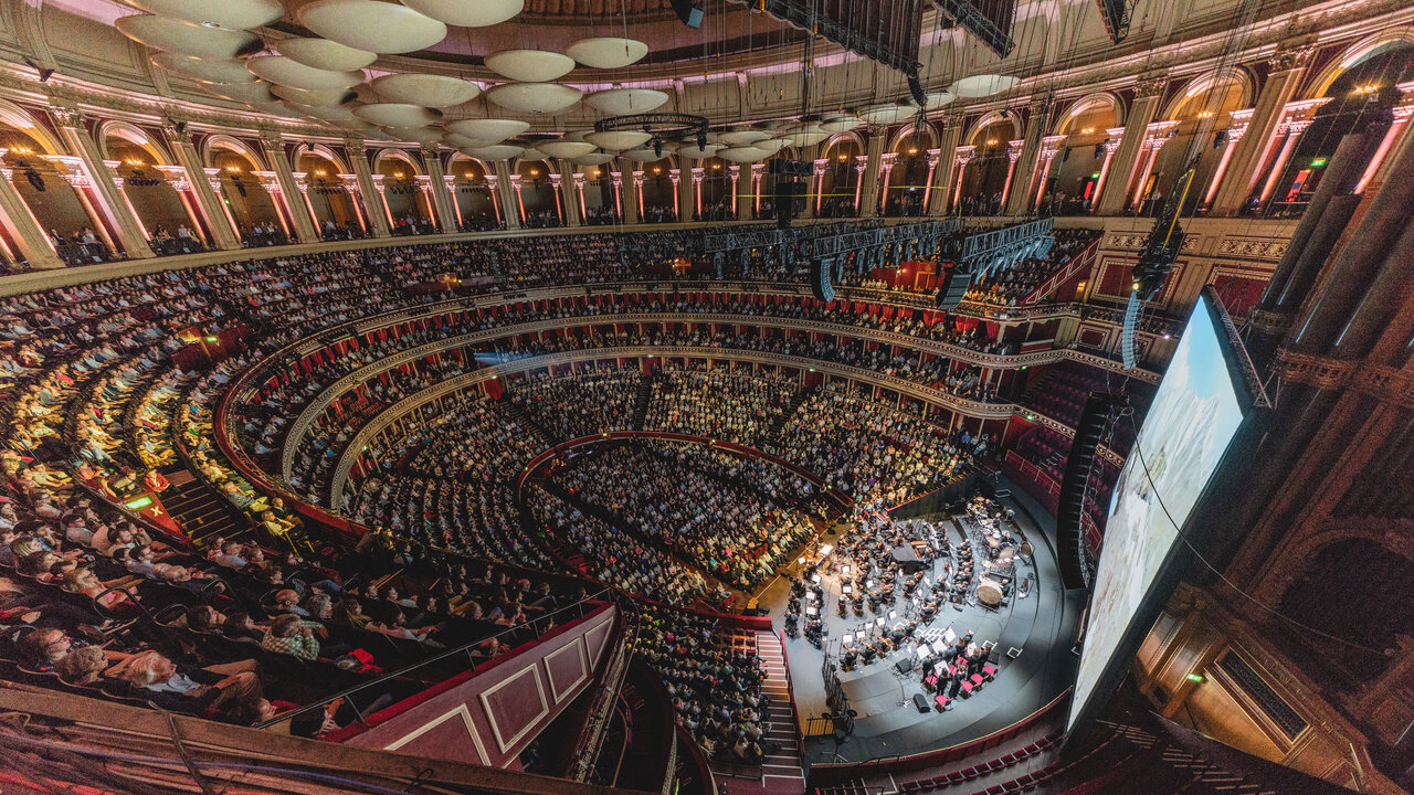 A packed audience at the Royal Albert Hall experiencing a Live in Concert performance
